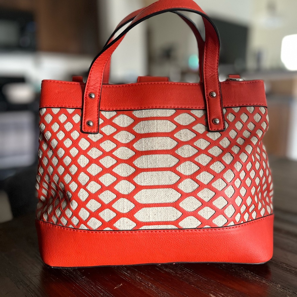 Joe’s Orange and Canvas Handbag